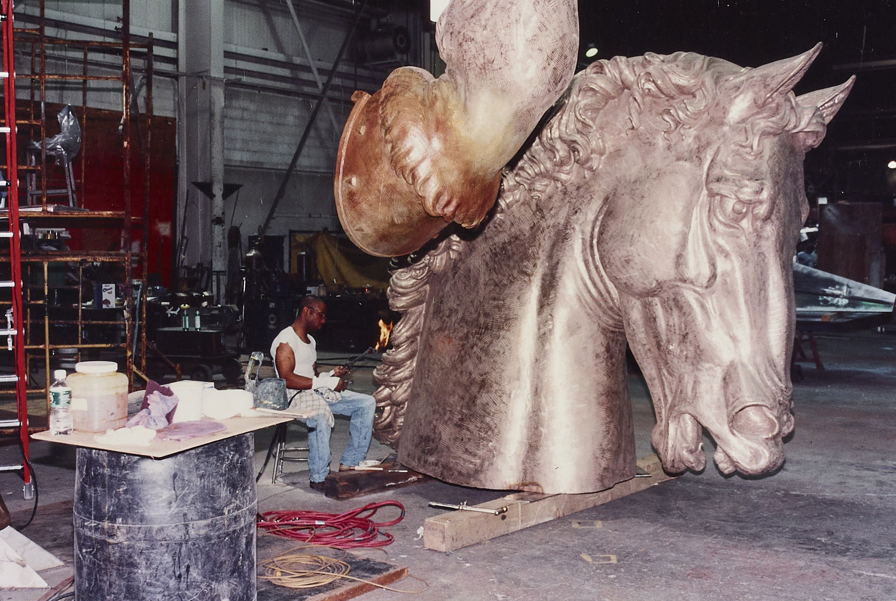 IN 1997, THE CREATION OF THE BRONZE MODEL IN BOSTON. ARTIST, NINA AKAMU